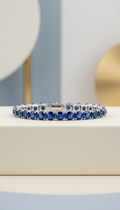 Platinum tennis bracelet with blue sapphires