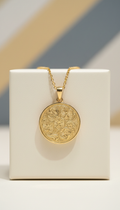 18k gold pendant necklace with hand-engraved detailing